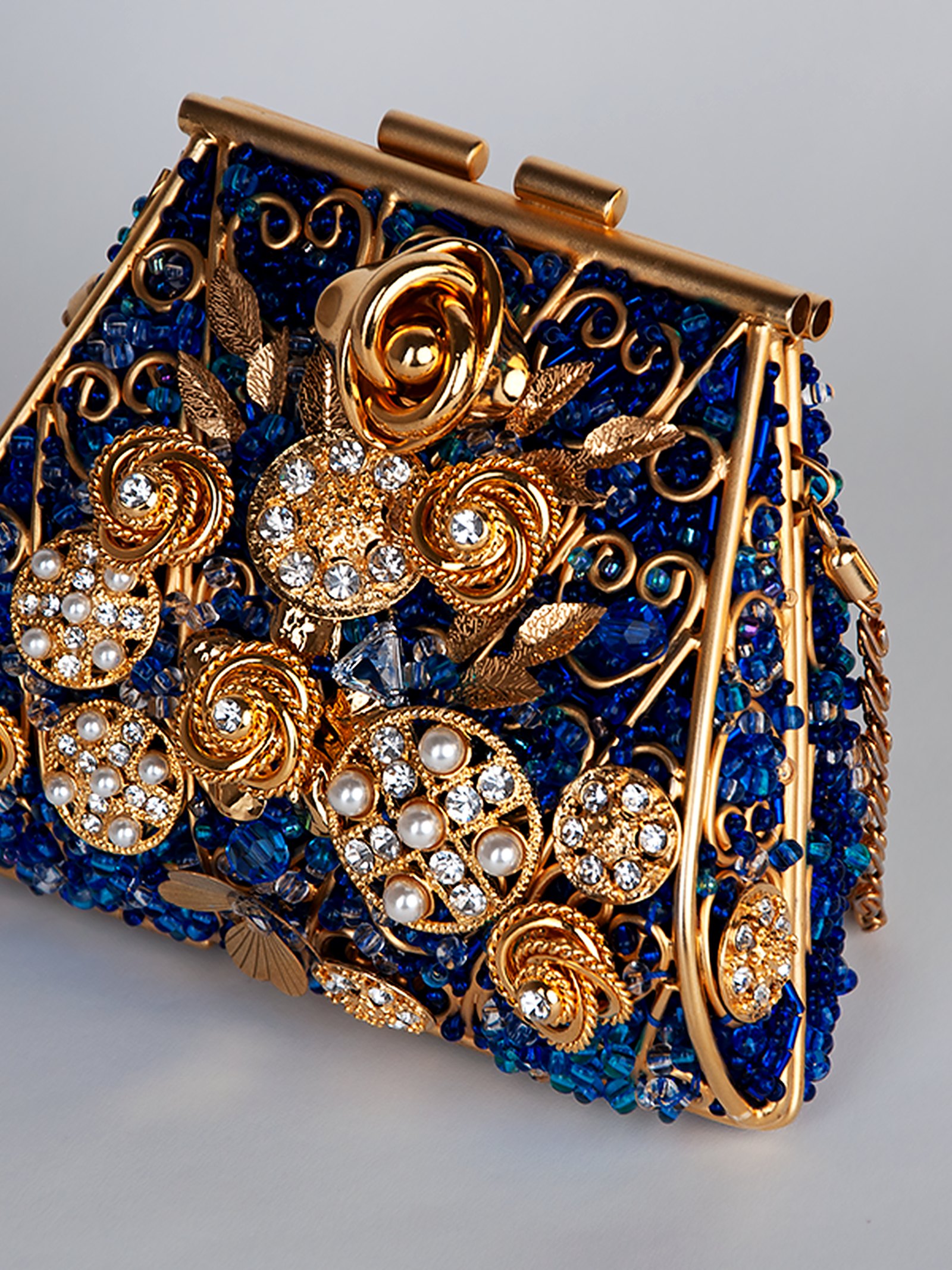 Le Jardin Royal — Une minaudière saphir. Un jardin de nuit.